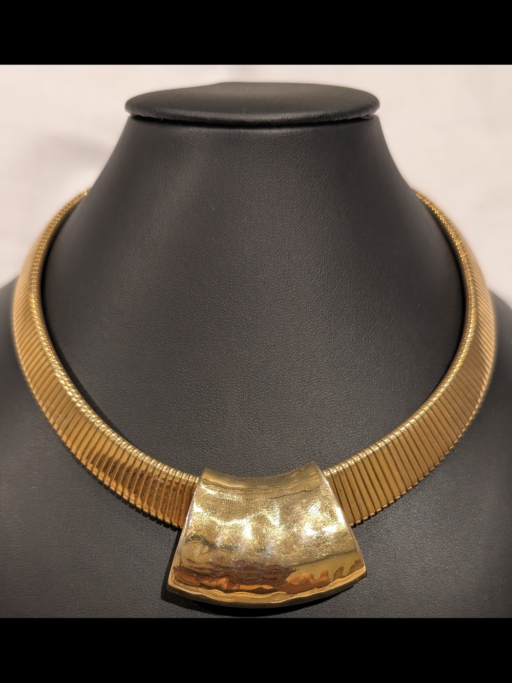 Monet Gold Ribbed Collar Necklace with Hammered Centerplate